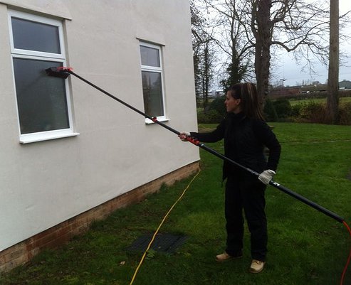 Window cleaner at work in Ruislip
